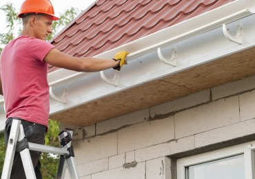installing a guttering system in Newcastle
